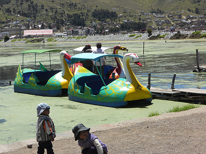 <img src="../BGNphotos/JoaniePhotos/JoaniePeru2013/E92punoView2.JPG" alt="Lake Titicaca and Puno" width="683" height="512" border="0">